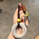 Grip trainer stress-relief keychain pendant