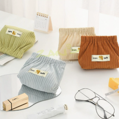 Corduroy automatic closure portable storage bag