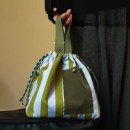 Handheld and crossbody insulated bag
