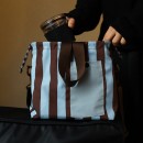 Handheld and crossbody insulated bag