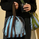 Handheld and crossbody insulated bag