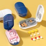 Portable pill cutter and medicine box