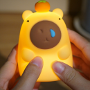 Capybara taps the small night light Capybara taps the small night light