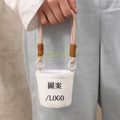 Handheld and crossbody fabric cup sleeve
