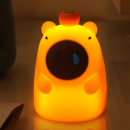 Capybara taps the small night light Capybara taps the small night light